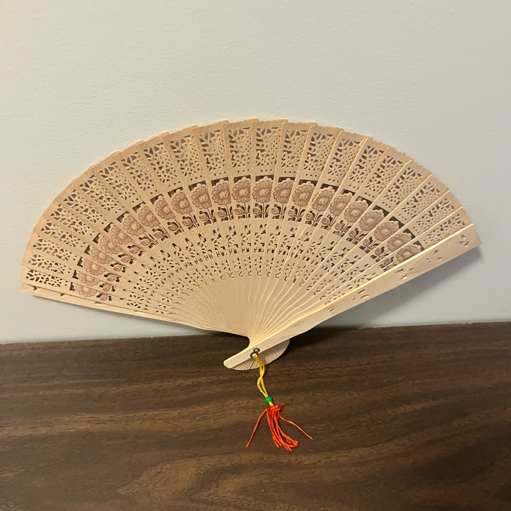 Elegant Beige Hand Fan with Intricate Design